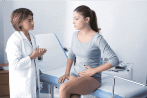 Gynecologists' discussing findings during Gyanecological check up