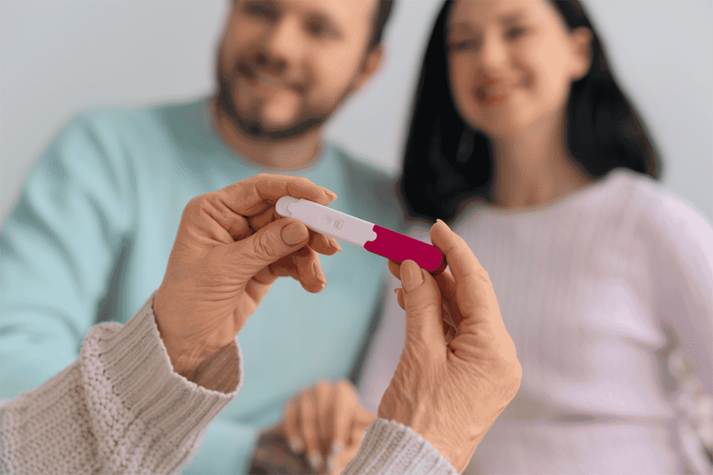Couple observing pregnancy test