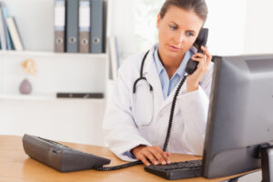 Doctor attending aptient's phone call