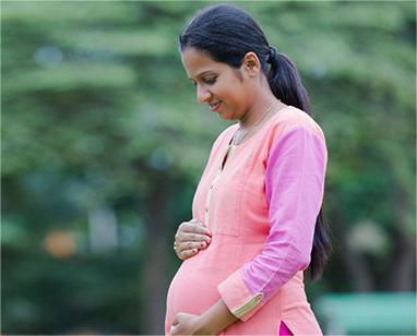 Pregnant indian female roaming outside